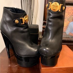Versace Black Heeled Boots with Gold Accents